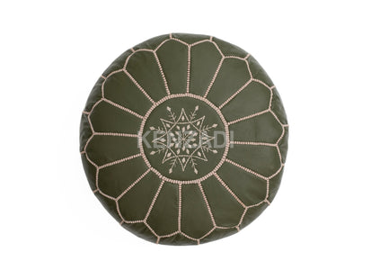 Image of vintage green Moroccan pouf in a traditional setting